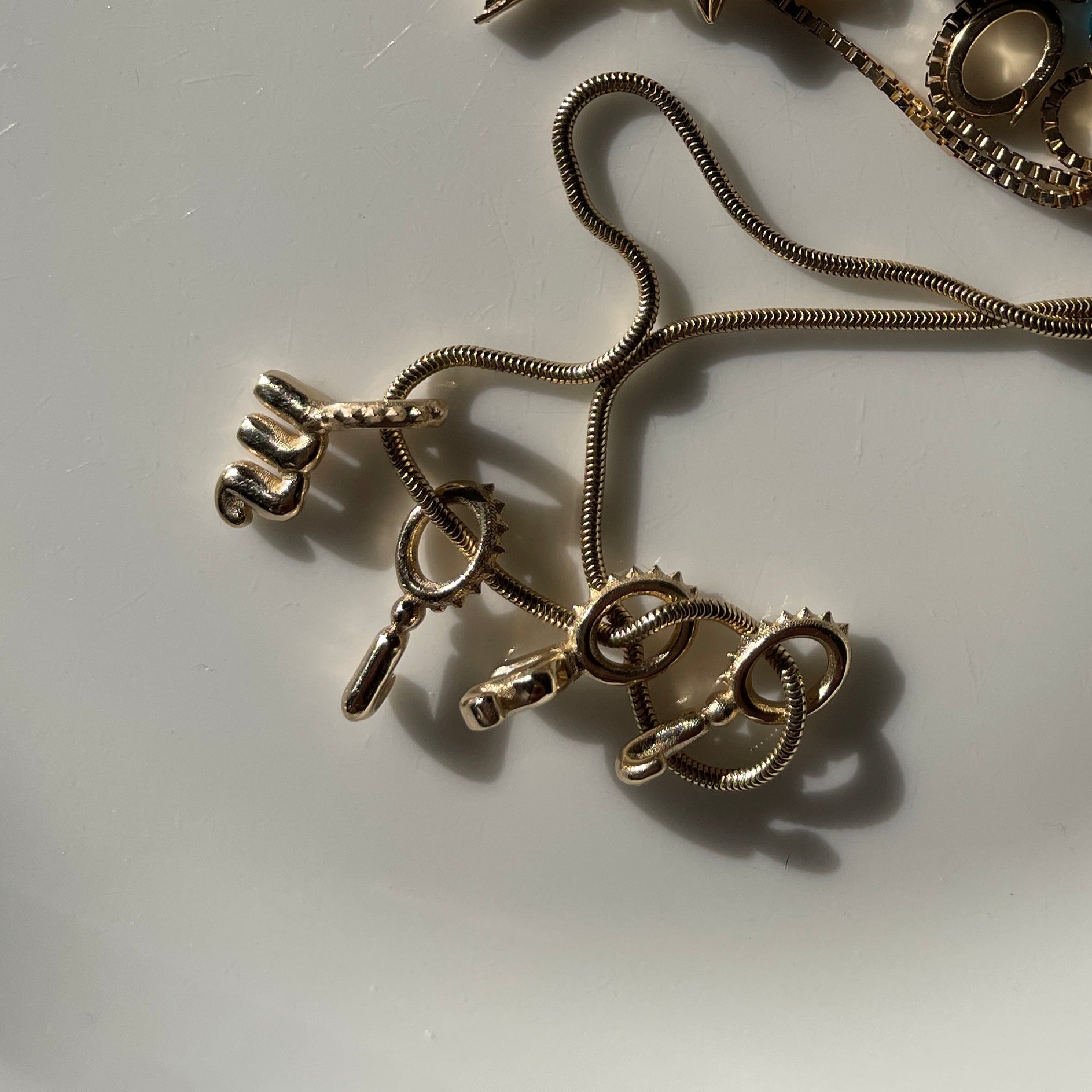 Gold Bubble Letter Charm