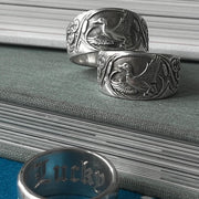 Three silver duck rings