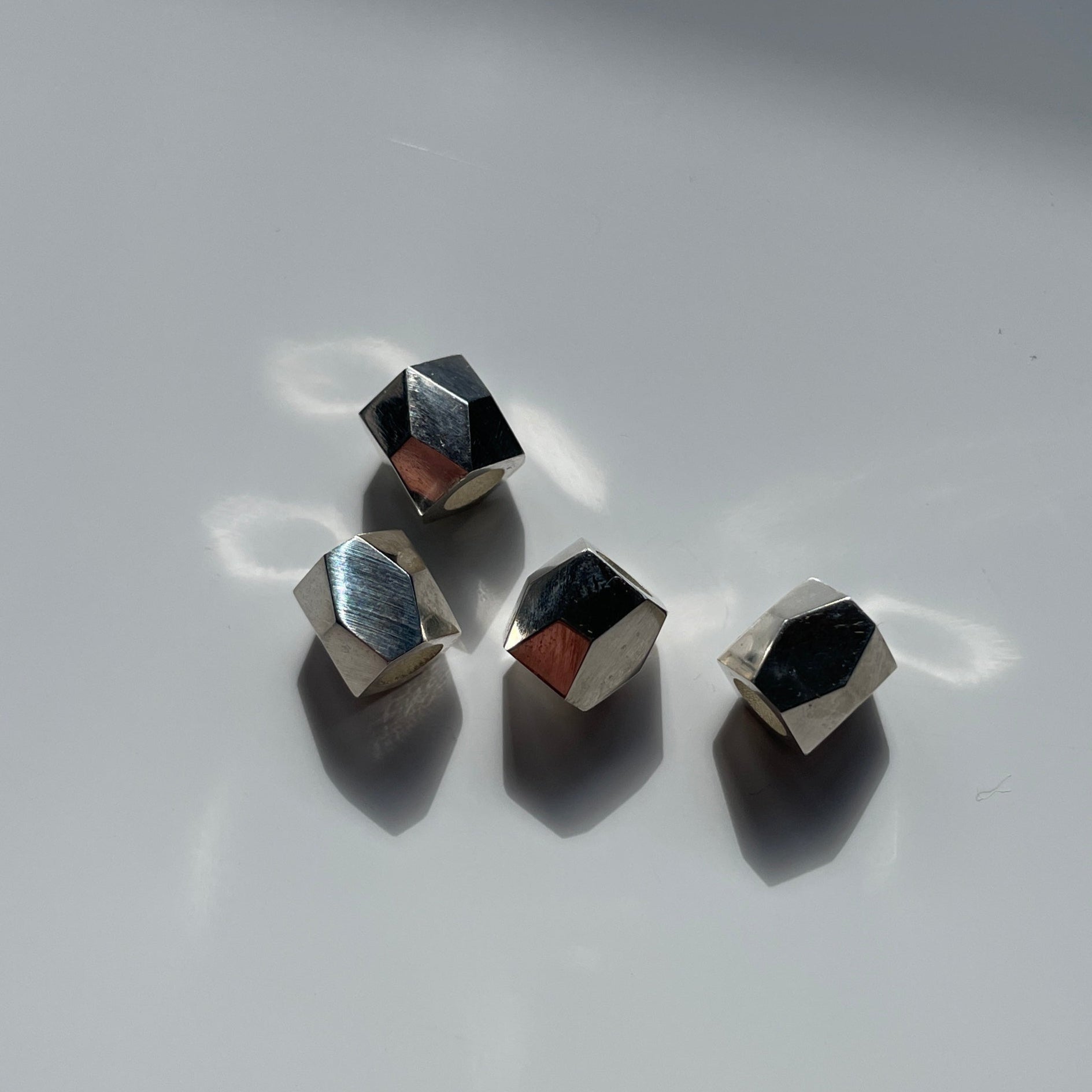 Sterling Silver Faceted Spacer beads on white background