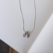 Silver necklace with heart charms