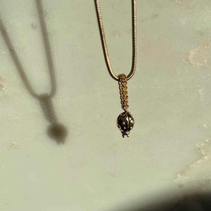 Gold Lady bug charm