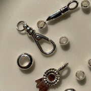 Silver charm holder