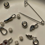 Collection of silver charms