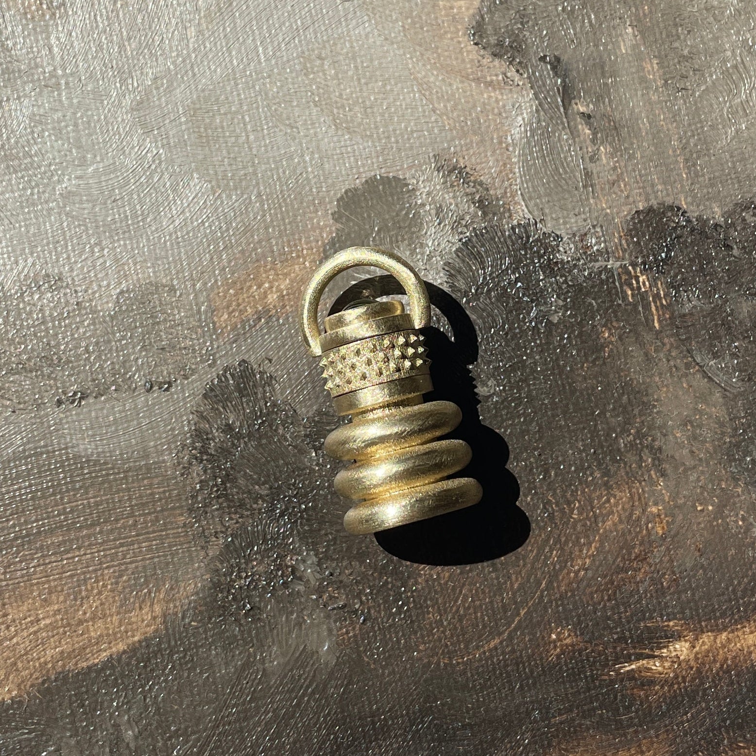 Solid gold perfume bottle