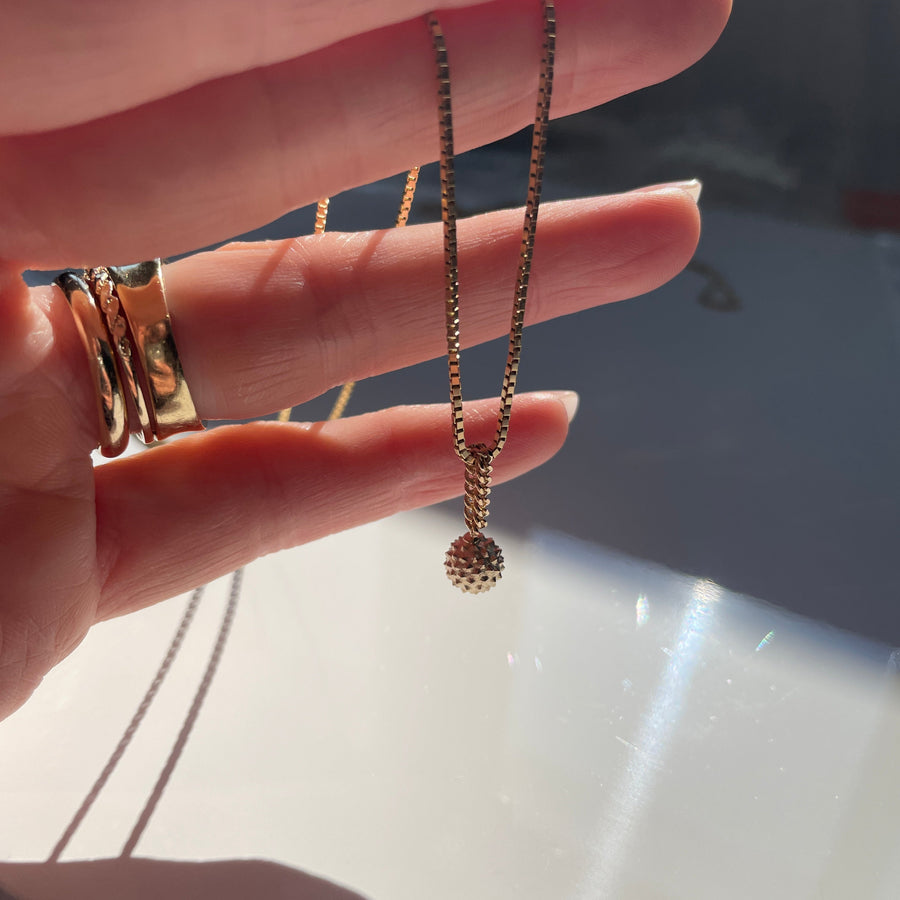 Wrecking ball charm