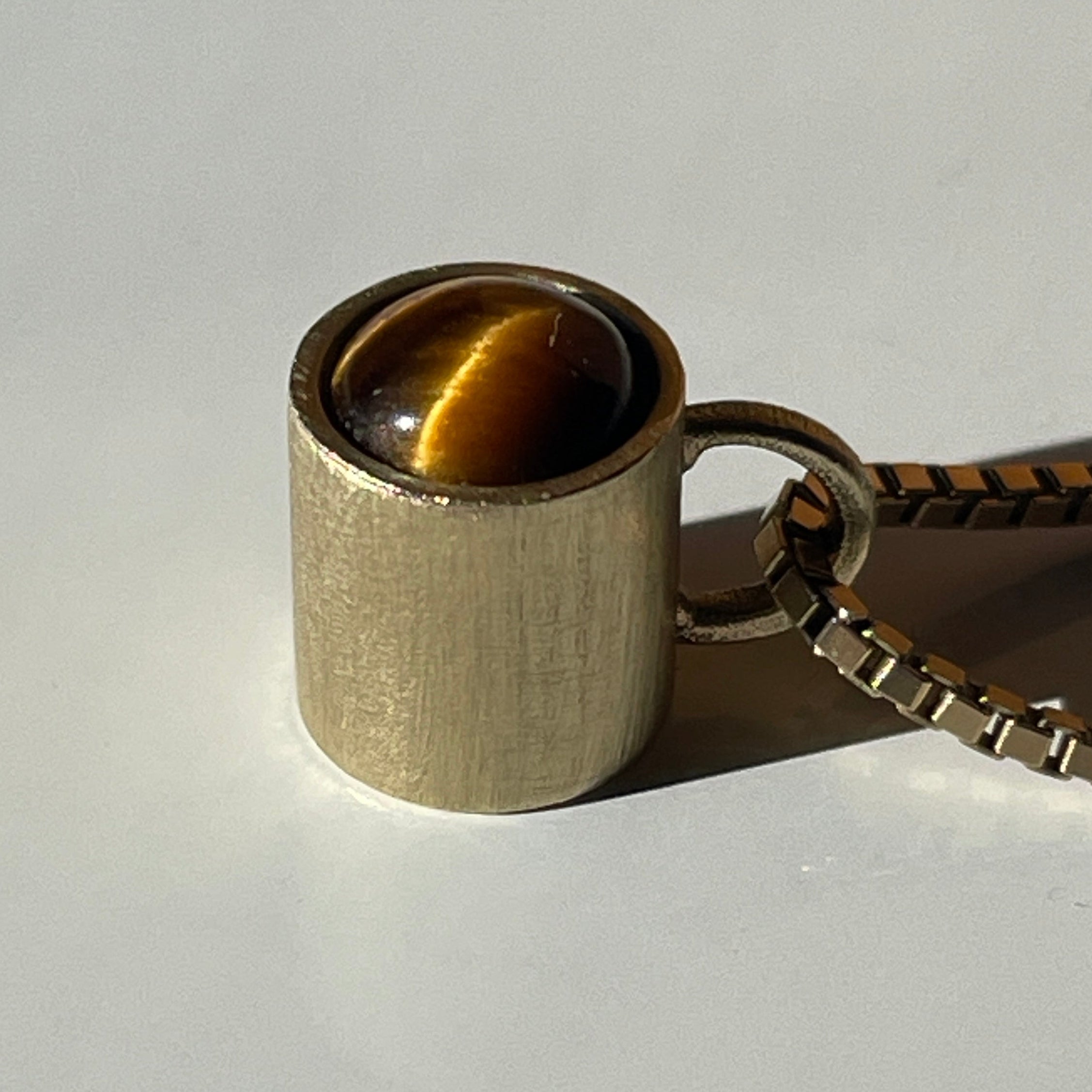 Gold Coffe cup with tiger's eye cabochon 