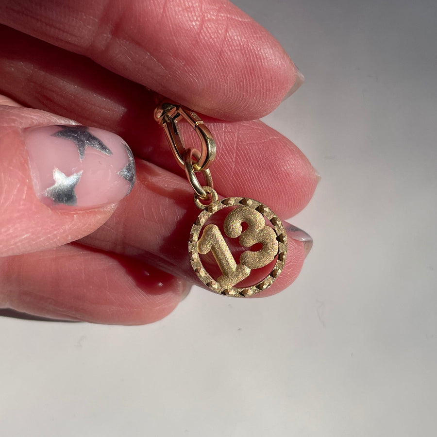 Gold lucky 13 charm