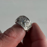 Holding silver duck ring