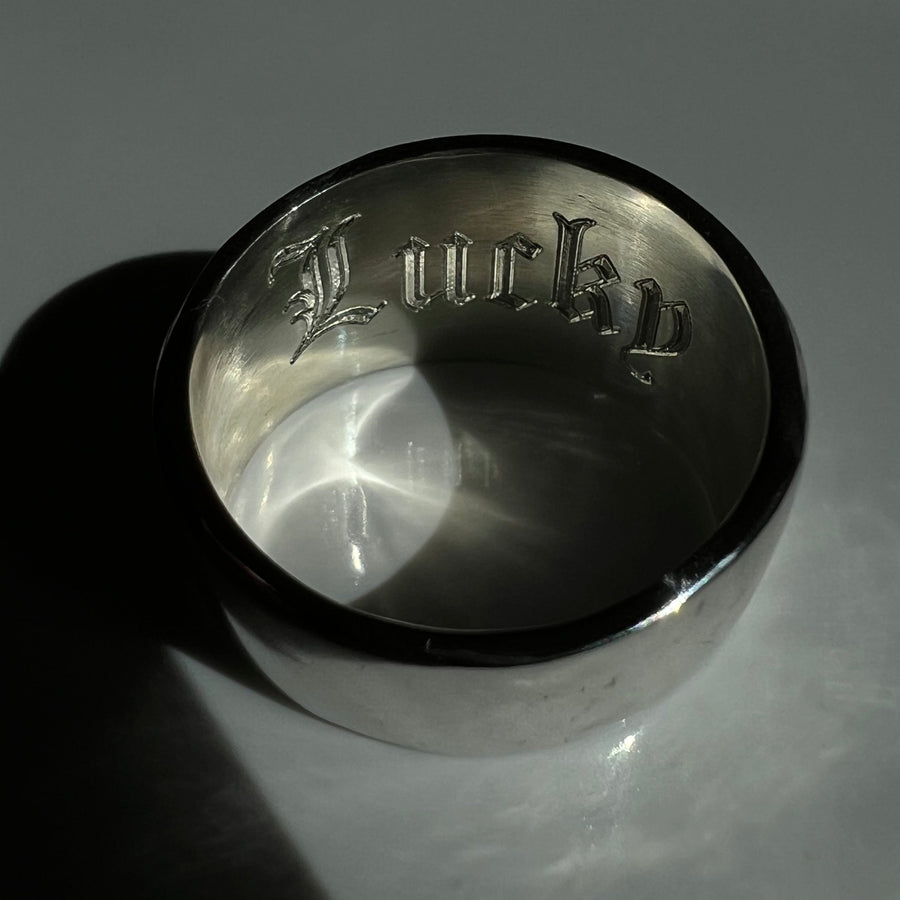 Inside ring engraved with Lucky